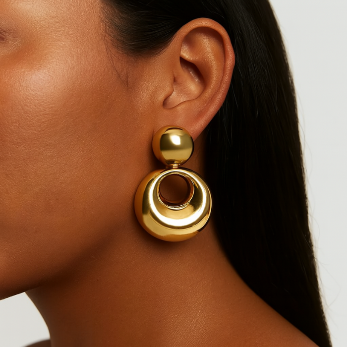 18k gold cutout earrings on model