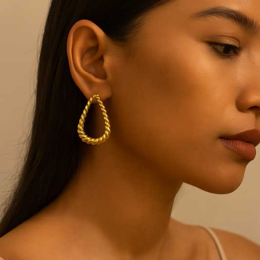 18k twisted gold stud earrings on model
