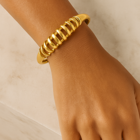 bold cutout gold bracelet on model