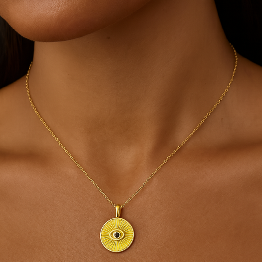 eye ray gold necklace on model