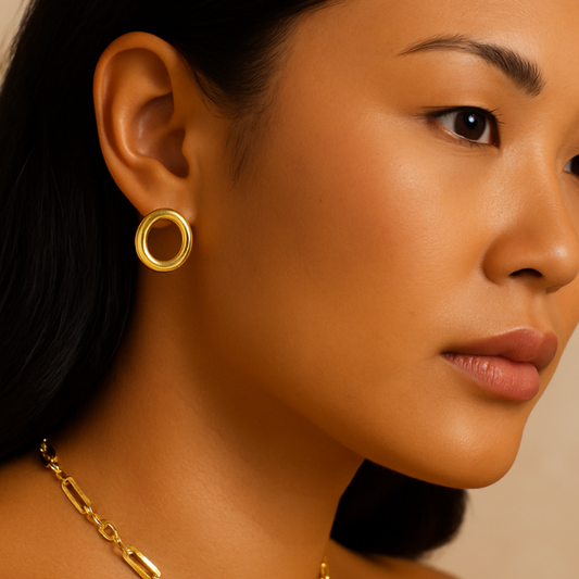 gold plated circle drop earrings on model