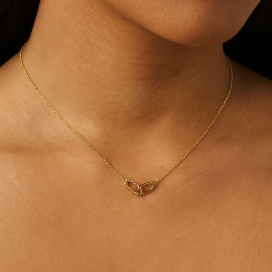 interlocked gold necklace on model