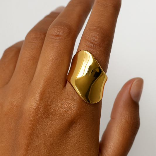 sculptural 18k gold irregular ring on model